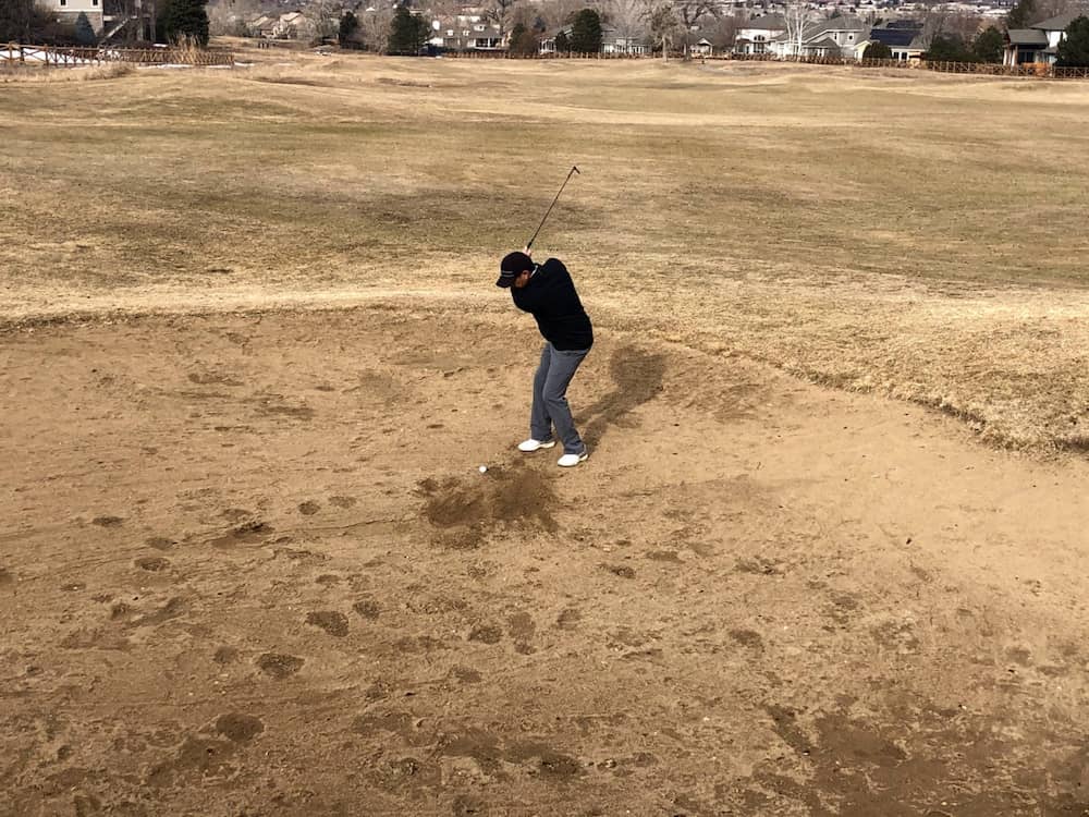 Golf Bunker Sand Shot - Backswing