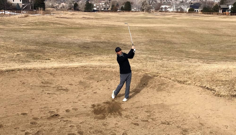 Golf Bunker Sand Shot - Follow Through