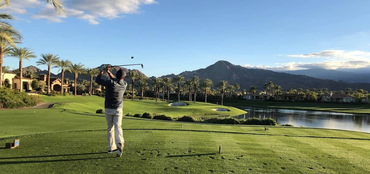 Golf Swing Follow Through with Beautiful Landscape